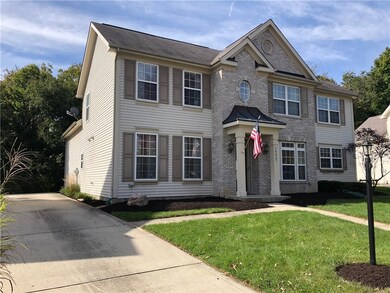 Landscaping beds freshly mulched and cleared. Blank canvas for you. Rear load garage.