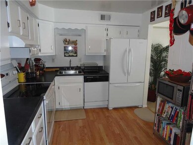 Kitchen. Kitchen to the left when you walk in