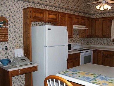 Kitchen. lots of cabinets and desk area