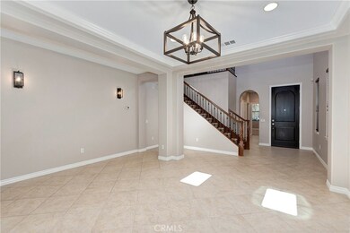 Entry door with hallway to garage and office on the left.