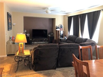 FAMILY ROOM VIEW FROM THE KITCHEN. NICE CUTOUT FOR