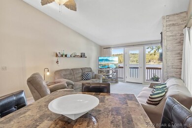 Dining space open to the kitchen and living area.