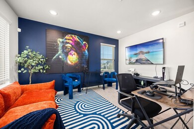 Large office, media room or game room.