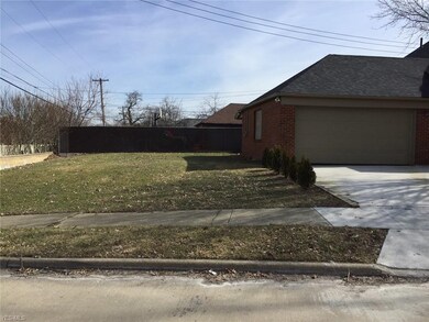 Side lot and attached 2 car garage.