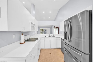 186 Pebble Shores Dr unit 203, Naples, FL 34110 - photo 3