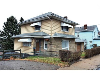 Exterior Front. integral garage and additional off