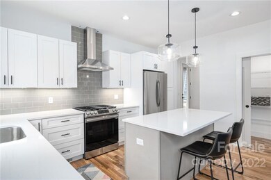 Beautiful Subway-Tile Backsplash and a Breakfast Bar