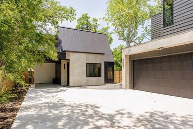 View of front of home with concrete driveway and 