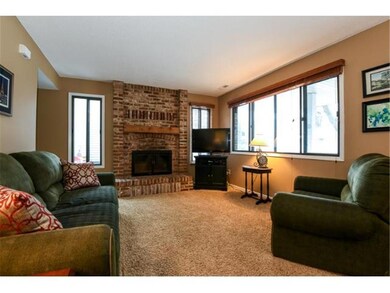 Living Room with beautiful wood-burning fireplace 