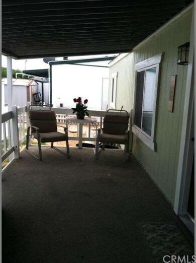 Relax in the shade of your large porch. 
