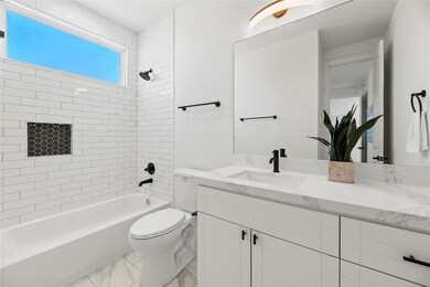 The 1st floor en-suite bath room has lots of count
