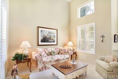 Formal Living Room with Cathedral Ceilings & Plant