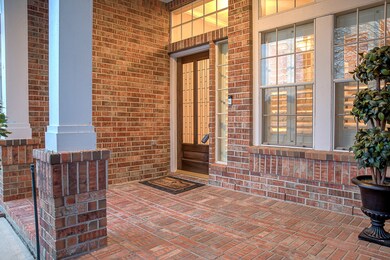 This large front porch is the perfect spot for you