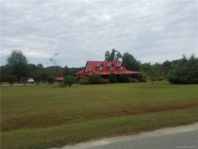 Log home across the street