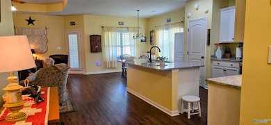 As you enter, there is a formal dining room on your right.