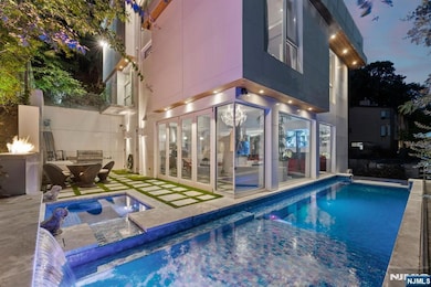 Inspired by contemporary West Coast Architecture, this Home Captures the Essence of Light, Space, and Effortless Sophistication