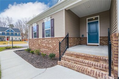 Enter the home from this beautiful front porch!