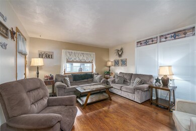 Living Room Also Features A Bay Window