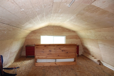 Bonus room featuring vaulted ceiling