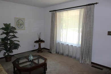 The spacious Living Room is the perfect spot to en