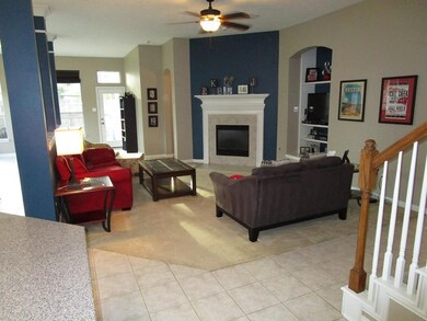 Living room with gas log fireplace