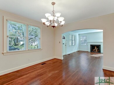 Formal dining room view into living room
