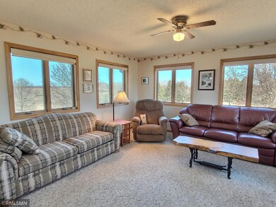 Sun room is off the dining room and great spot to escape to for some reading or conversation. The room has ample windows and walks out to a private deck area.