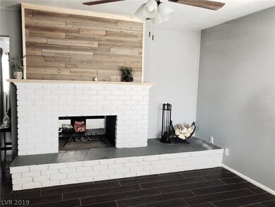 Double-sided fireplace (dining & family room side)