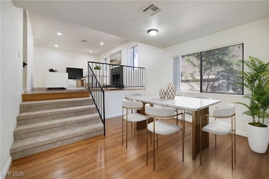 Virtual Staging Dining space featuring stairs, lig