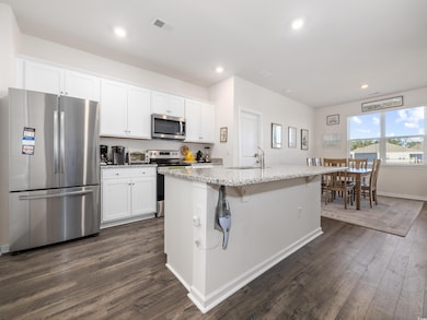 Kitchen featuring appliances with stainless steel 