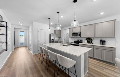 Interior photos are of a staged model home. Illust