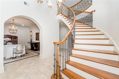 Beautiful winding stair, elegant formal dining