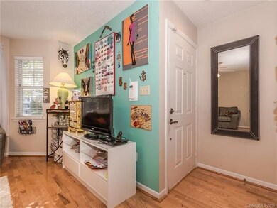 Wood floors throughout living area.