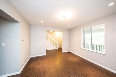 Large and sunlit living rooml.