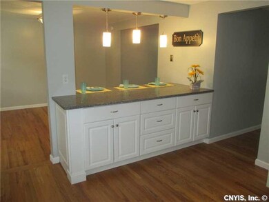 Kitchen. YOU WILL LOVE THE SPACIOUS BREAKFAST BAR.