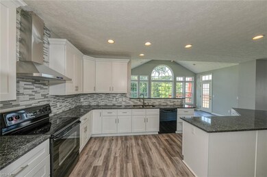This stunning gourmet kitchen features all new sle