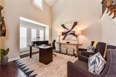 Two story office area with plantation shutters!