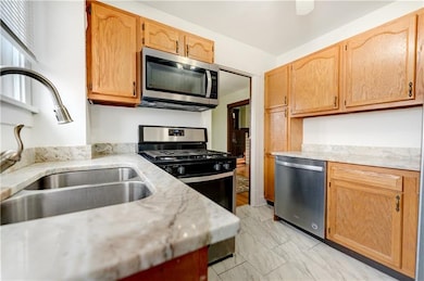 Kitchen with granite counter tops and new appliances 2020!