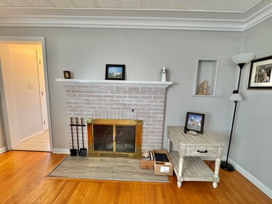 Wood burning fireplace in living room