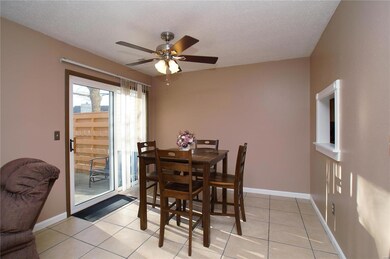 Breakfast Room with Sliding Glass Door to the Pati