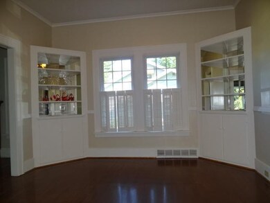 Dining Room. Hard wood floor, neutral paint, lovel