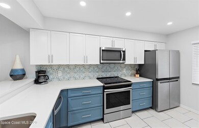 Modern Navy and White Cabinets