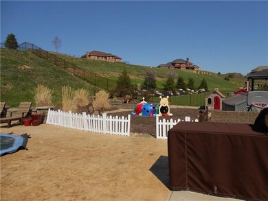 STAMPED CONCRETE PATIO TO PLAY AREA