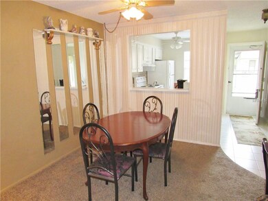 Dining area with pass thru to kitchen.
