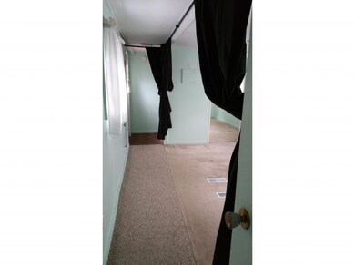looking towards back hall where washer and dryer a