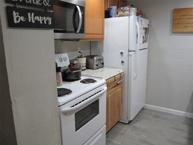 Kitchen has updated lower cabinets with recently u
