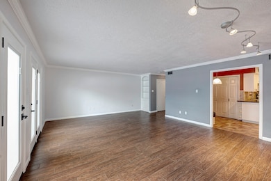 Family room viewed from another angle towards kitc