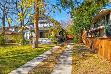 Long tandem drive with a 4ft privacy fence.