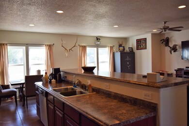 Kitchen Opens to Living Room