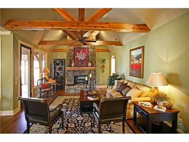 Awesome hearth room with wagon wheel beams and Ark